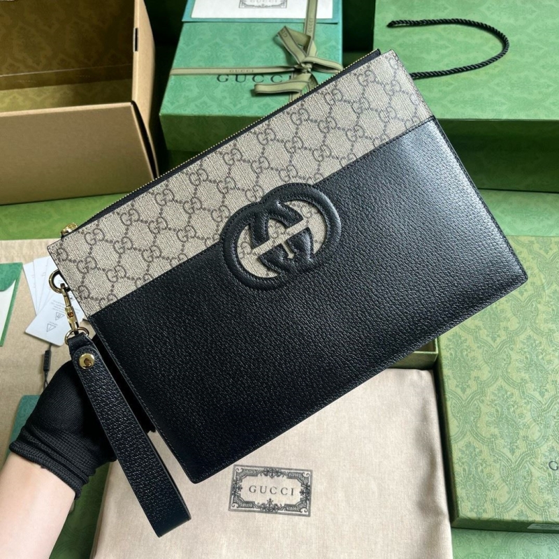 G*u*i clutch bags